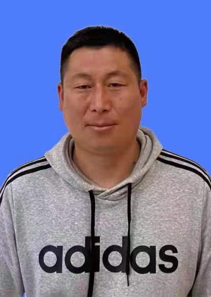 王震 