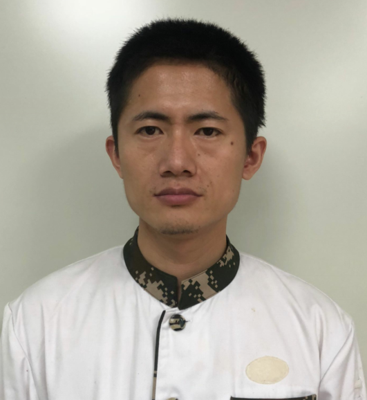 谢建成 